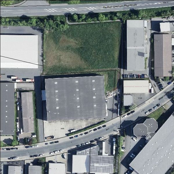 Luftbild: Auschnitt GE St. Georgen - Ost mit Straßenzügen, Hallen und einer unbebauten Fläche